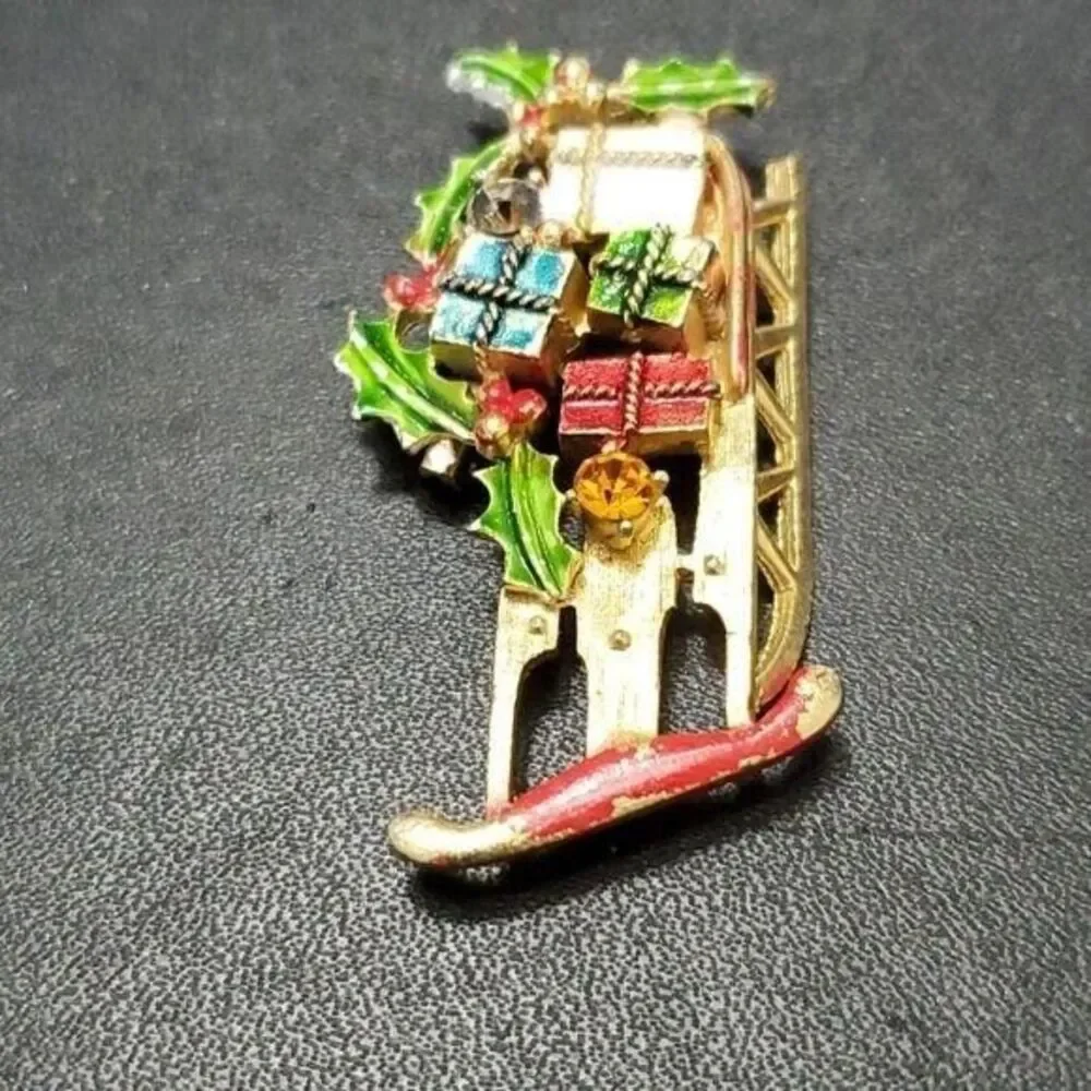 Vintage Weiss holiday sled brooch gold tone red green